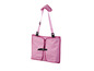 Une chaise pliable portable de couleur rose.