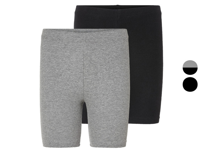 Deux paires de shorts de vélo côtelés, un gris et un noir.