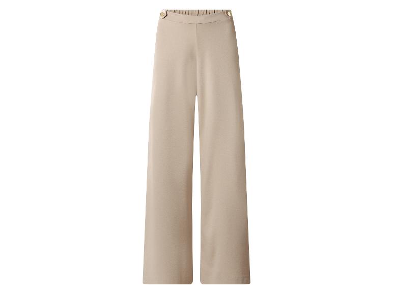 Pantalon palazzo beige taille haute avec boutons décoratifs.