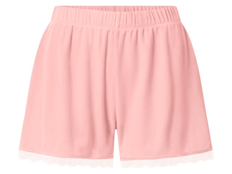Short rose pour femme avec taille élastique et bordure en dentelle blanche.