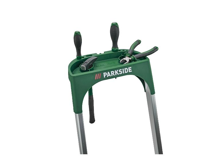 Support à outils vert Parkside avec tournevis, marteau et pinces.