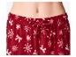 Pantalon de pyjama rouge avec flocons de neige et nœuds blancs, avec cordon de serrage à la taille.