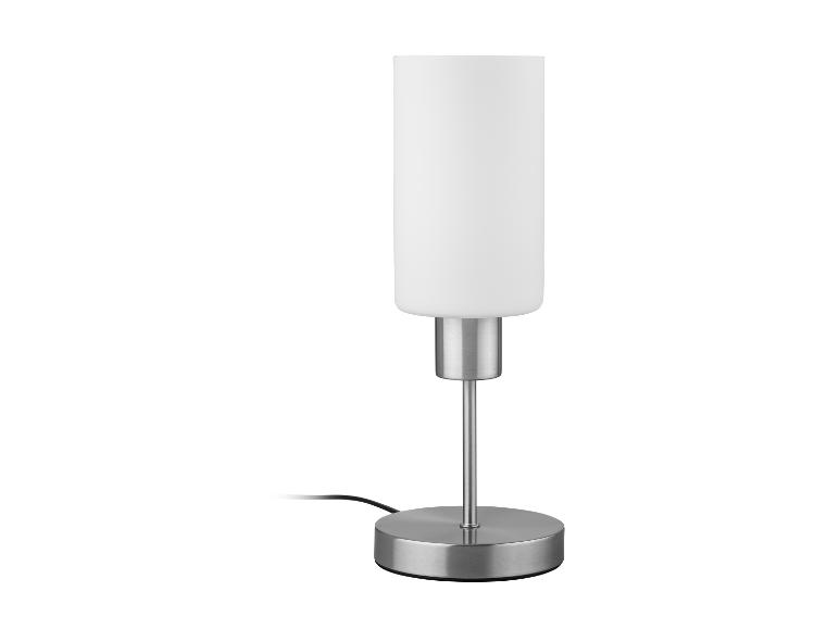 Lampe de table moderne avec abat-jour cylindrique blanc et base métallique.
