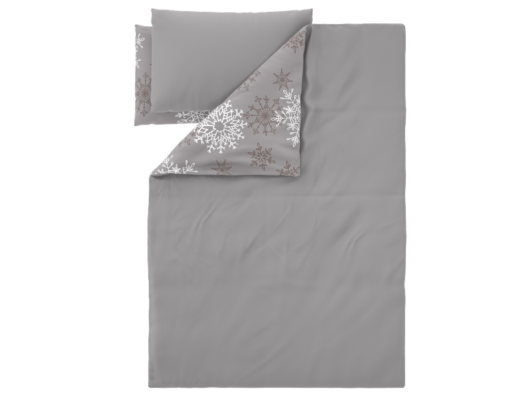 Parure de lit grise avec motif de flocons de neige sur le revers et la taie d'oreiller