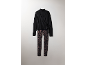 Ensemble composé d'un col roulé noir effet cache-cœur et d'un legging imprimé léopard.