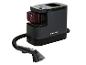 Un aspirateur Silvercrest avec une station de charge et une buse.