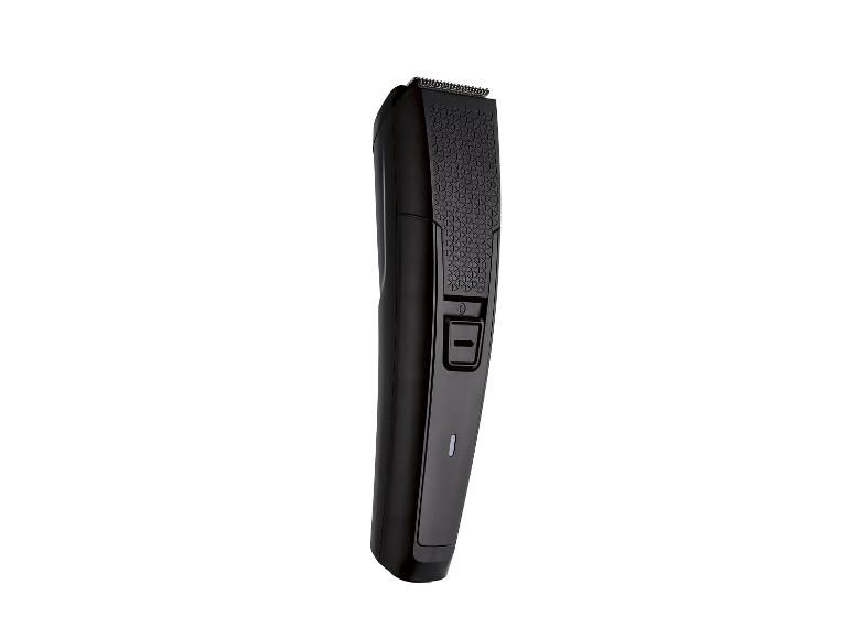 Tondeuse à cheveux et barbe noire avec bouton marche/arrêt et indicateur de batterie.