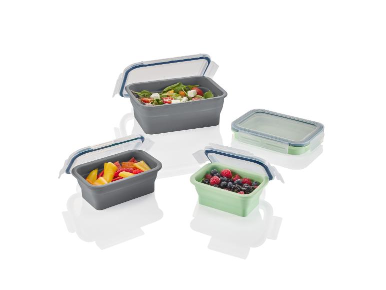 Boîtes repas pliables : salade, poivrons et fruits rouges.