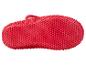 Semelles de chaussures rouges texturées.