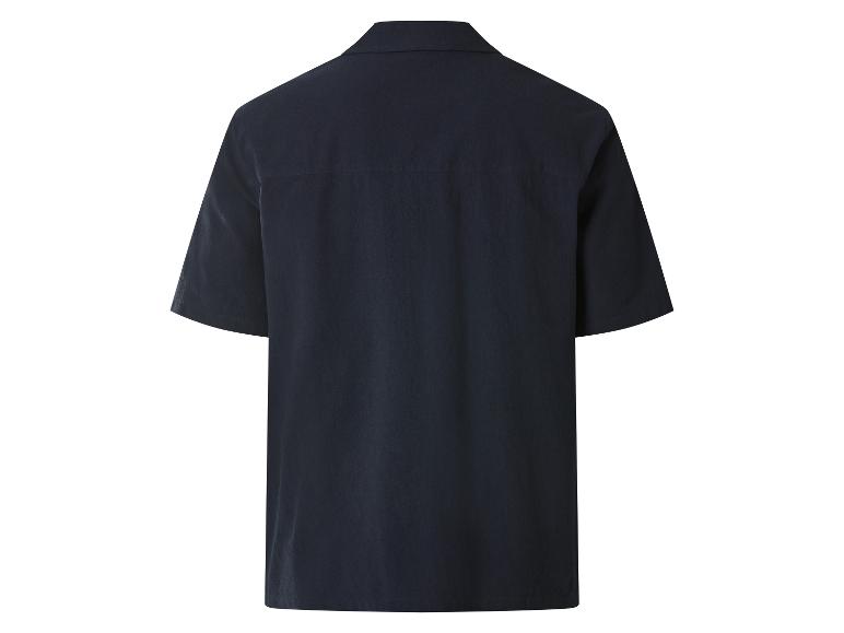 Chemise bleu foncé à manches courtes et col, vue de dos.