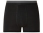 Boxers noirs avec une ceinture élastique grise.