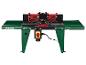 Table de toupie Parkside : dessus de table vert, guides rouges.