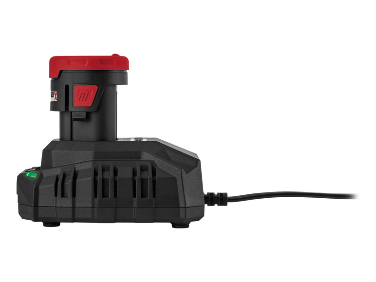 Un chargeur noir avec une batterie rouge.