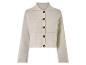 Veste en tricot beige à boutons.