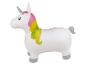 Jouet gonflable licorne blanche à crinière colorée.