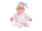 Poupée bébé en tenue rose avec bonnet, sucette et biberon.
