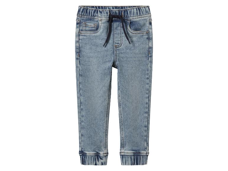 Pantalon jogger en jean bleu clair pour enfants avec cordon de serrage à la taille et poignets élastiques.