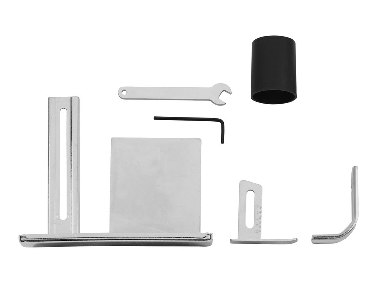 Un ensemble d'outils pour une machine à coudre, comprenant un pied, un tournevis et une clé.