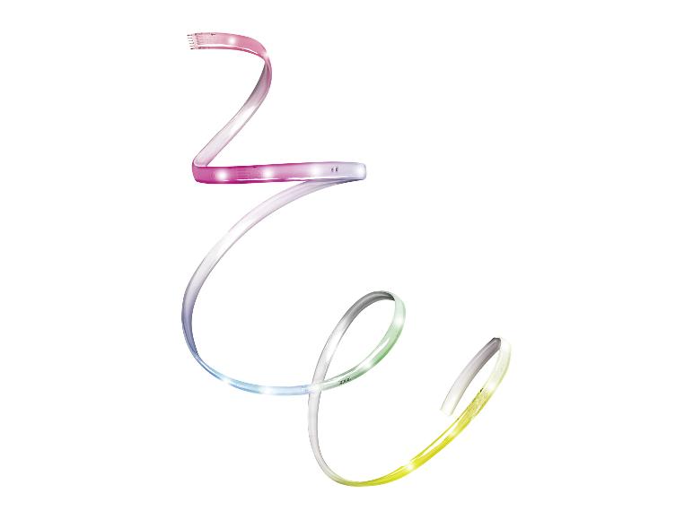 Bande lumineuse LED colorée enroulée sur un fond blanc.