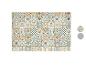 Carreaux décoratifs aux motifs géométriques et floraux dans des tons chauds et froids.