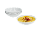 Soupe crémeuse dans un bol blanc, avec trois bols blancs empilés.