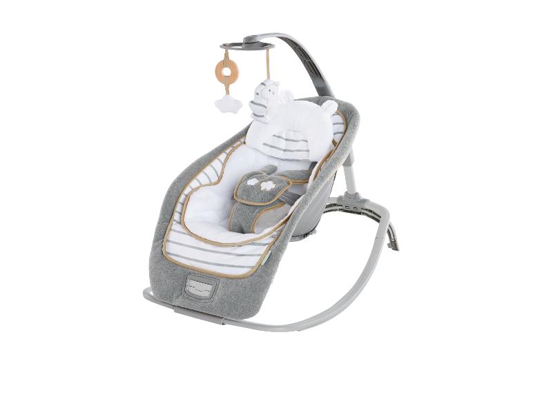 Transat-balancelle gris et blanc pour bébé avec jouets et harnais de sécurité.