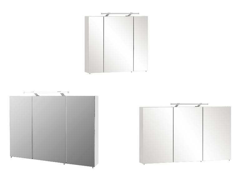 Trois armoires de salle de bain blanches avec portes miroir et éclairage