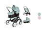Une poussette Maxi-Cosi avec un revêtement en tissu vert.