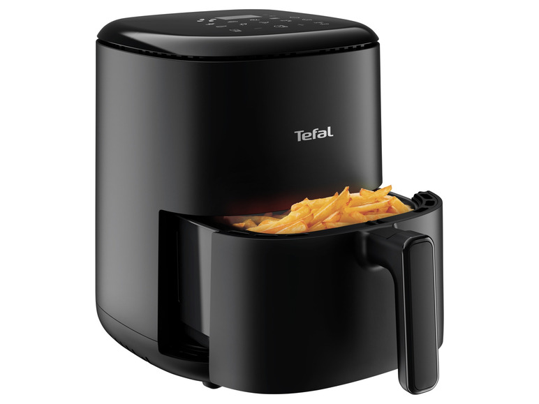 Une friteuse à air Tefal avec des frites.