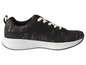 Des baskets noires avec des détails roses et une semelle blanche.