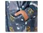 Une veste de pluie bleu marine pour enfants avec un imprimé de tigres et d'éléphants.