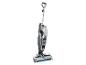 Nettoyeur de sols vertical multi-surfaces avec brosse rotative, argent et noir.