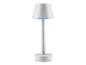 Une lampe de table blanche avec une bordure bleue.