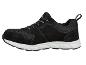 Sneakers noires en daim et mesh avec lacets et semelle blanche.