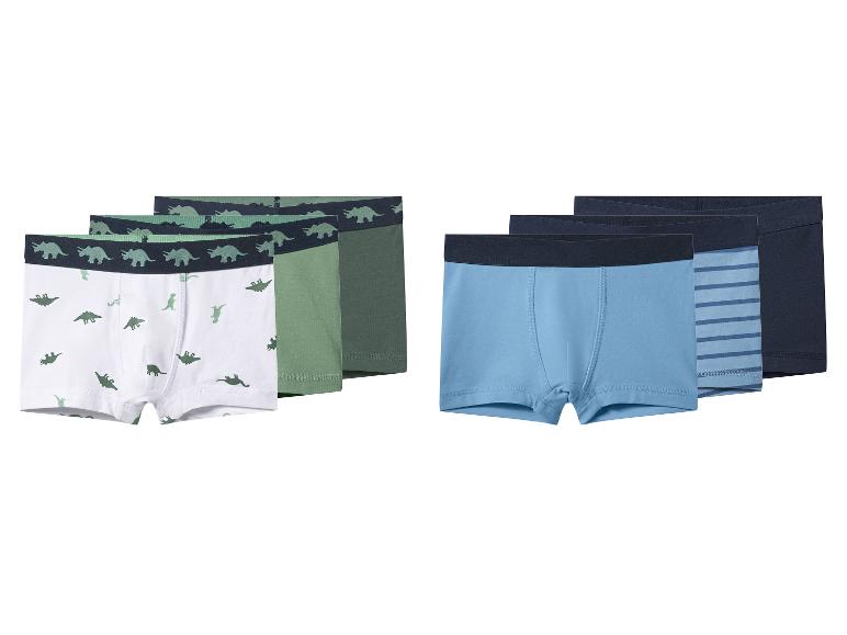 Six paires de boxers pour garçons: trois avec motifs dinosaures en vert et blanc, trois dans les tons bleus.