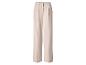 Pantalon plissé beige clair à coupe droite.