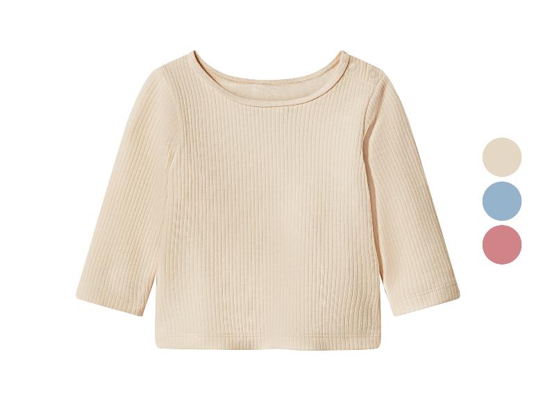 T-shirt bébé côtelé beige à manches longues avec boutons-pression à l'épaule.