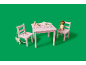 Table et deux chaises roses pour enfants avec motifs d'animaux de la forêt, blocs alphabet et fournitures d'art.