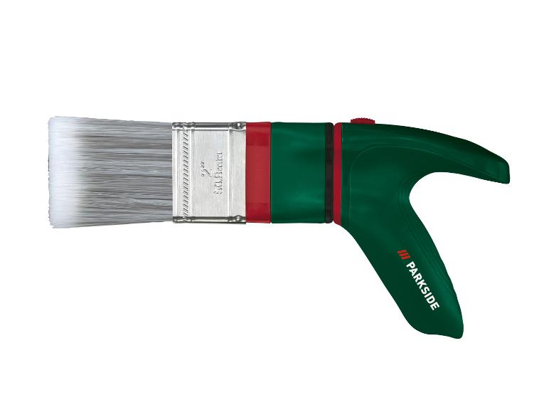 Un pinceau vert Parkside avec une poignée ergonomique.
