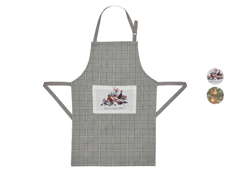 Tablier de cuisine à carreaux avec motif floral.