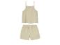 Ensemble de haut et short beige à pois blancs.