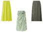 Trois jupes : unie vert clair, plissée vert olive, et imprimé géométrique vert et bleu.