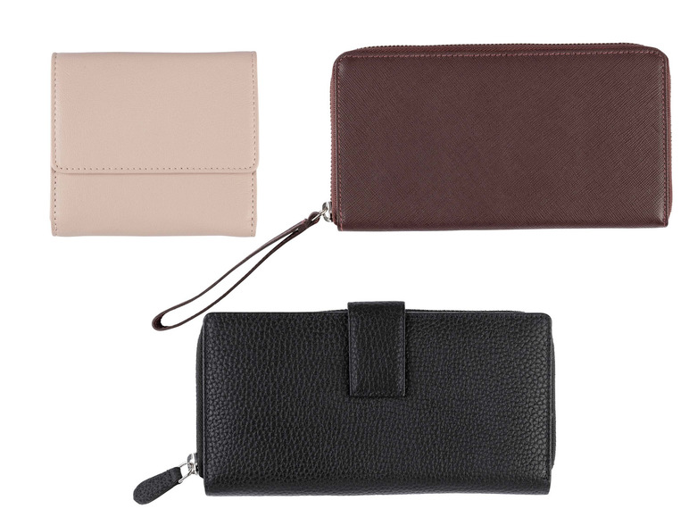 Trois portefeuilles en cuir : un rose, un marron et un noir.