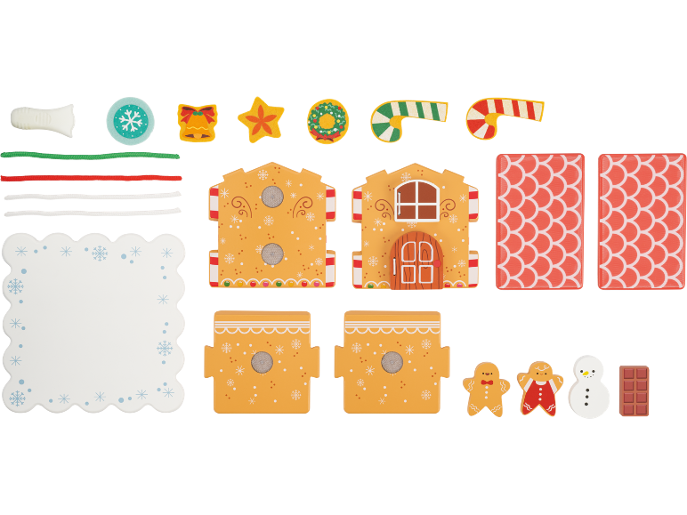 Maison en pain d'épices en bois avec accessoires et figurines de Noël.
