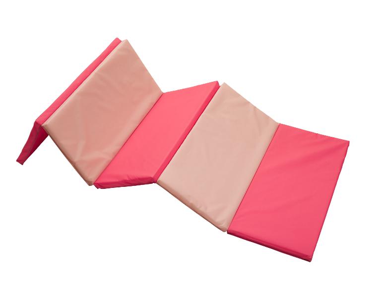 Un tapis pliable rose et beige pour le fitness et le yoga.