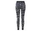Leggings bleu marine avec un motif de Noël, des rennes et des sapins de Noël.