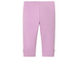 Leggings lilas avec des nœuds en bas.