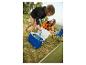 Glacière Crivit, chaises pliantes et boissons rafraîchissantes pour le camping.