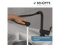 Un robinet de cuisine noir Schütte avec douchette extractible.