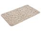 Tapis de bain rectangulaire beige avec un motif texturé en nid d'abeille